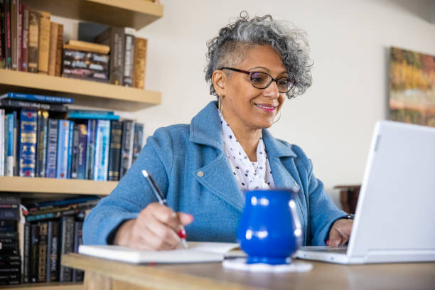 istock Mature Black Woman Working from Home 1300580152