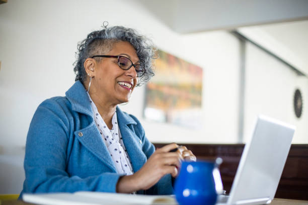 istock Mature Black Woman Working from Home 1300580173