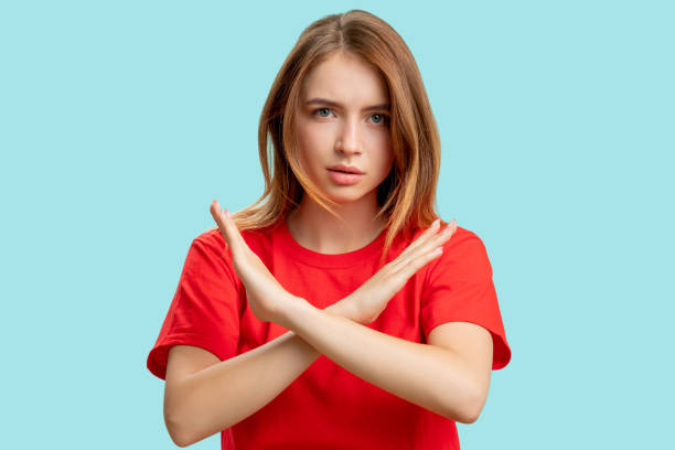 stop gesture no sign protesting woman crossed arms