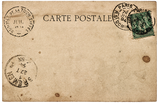 a vintage blank postcard printed in France in earlier 1900s,  ready for any usage of  historic events background related to mail delievery description.