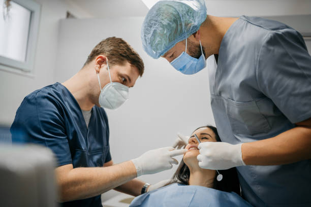 istock Colleagues dentists and patient 1300588858