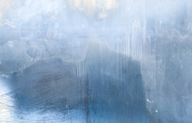 distressed overlay weathered glass blue layer Distressed overlay. Weathered glass. Blue layer with white smeared stains dust scratches defect. Faded window surface with noise effect for photo editor. frost on glass stock pictures, royalty-free photos & images