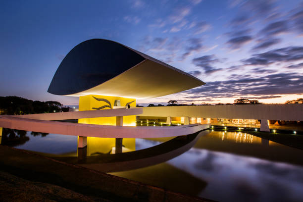 Oscar Niemeyer Museum, or MON, in Curitiba, Parana State, Brazil. Curitiba, Brazil - July, 2017: Oscar Niemeyer Museum, or MON, in Curitiba, Parana State, Brazil. southern brazil photos stock pictures, royalty-free photos & images