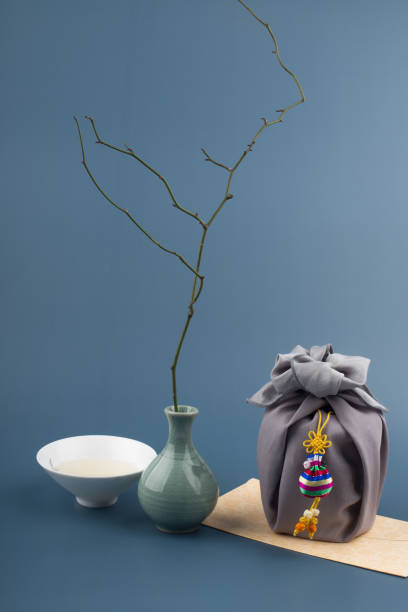istock Korean traditional wrapping cloth gift box on the gray background. 1300591886