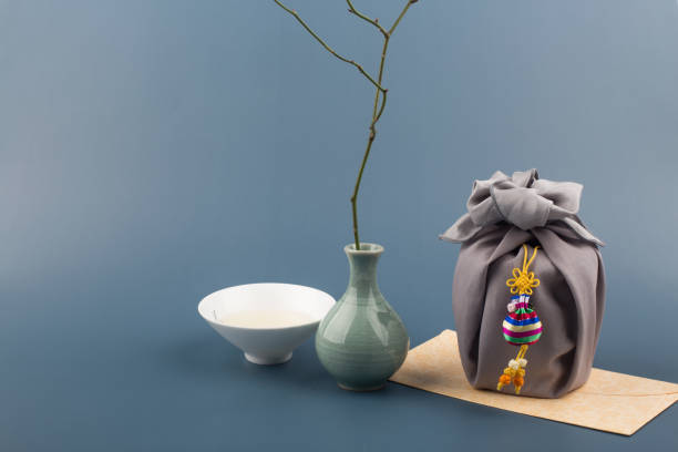 istock Korean traditional wrapping cloth gift box on the gray background. 1300591889
