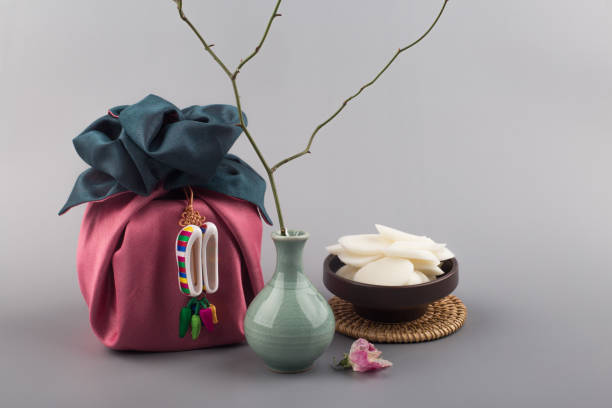 istock Korean traditional wrapping cloth gift box on the gray background. 1300591896
