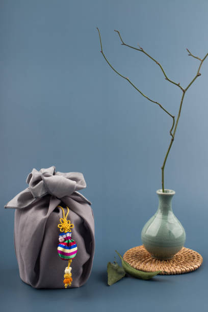 istock Korean traditional wrapping cloth gift box on the gray background. 1300591898