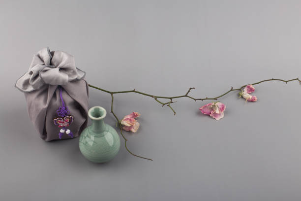 istock Korean traditional wrapping cloth gift box on the gray background. 1300591905