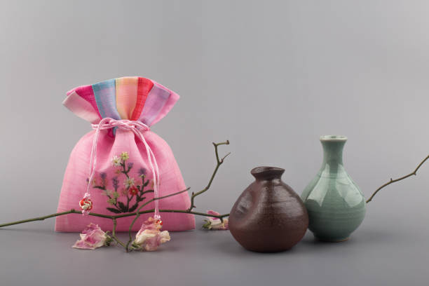 istock Korean traditional wrapping cloth gift box on the gray background. 1300591908