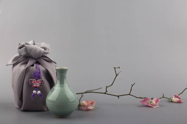 istock Korean traditional wrapping cloth gift box on the gray background. 1300591915