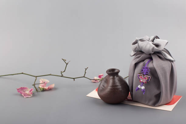 Korean traditional wrapping cloth gift box on the gray background.