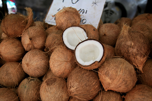 salvador, bahia, brazil - january 27, 2021: broken dry coconut is seen for sale at the fair in japan, in the Liberdade neighborhood in the city of Salvador.
