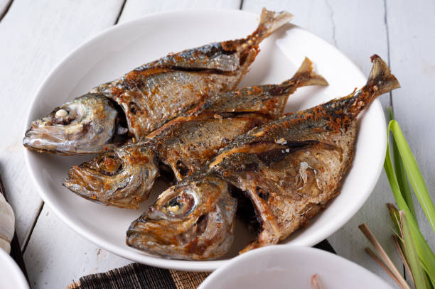 istock Deep fried mackerel with fish sauce, Traditional Thai food. 1300597059