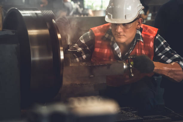 istock Smart factory worker or engineer do machine job in a manufacturing workshop 1300606371