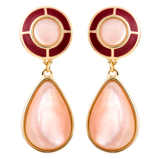 istock Golden earrings with gemstone isolated on white background 1300607074