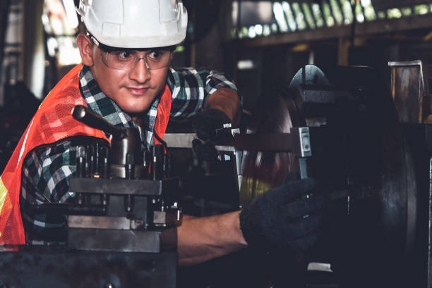 istock Smart factory worker or engineer do machine job in a manufacturing workshop 1300607189