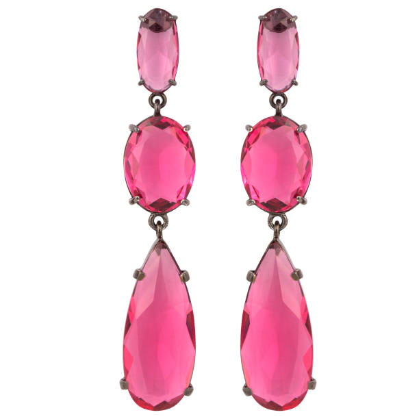 istock Golden earrings with gemstone isolated on white background 1300607320