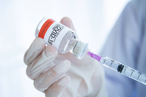 istock Doctor and COVID-19 Vaccine 1300607428