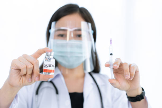 istock Doctor and COVID-19 Vaccine 1300608077