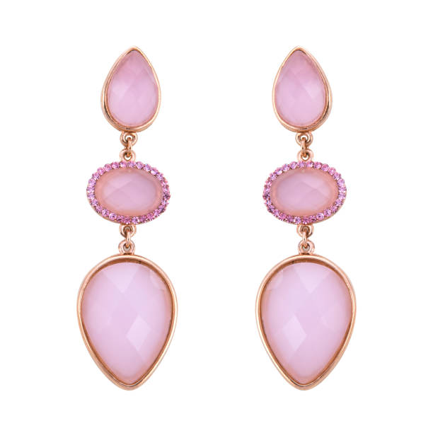 istock Golden earrings with gemstone isolated on white background 1300608971