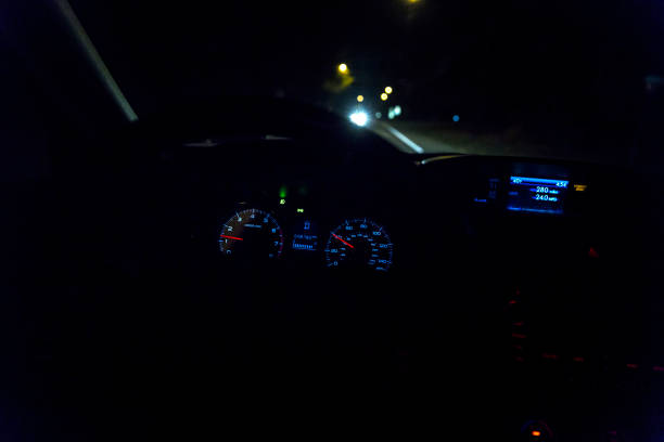 istock Night Driving Car Steering Wheel and Dashboard 1300609042