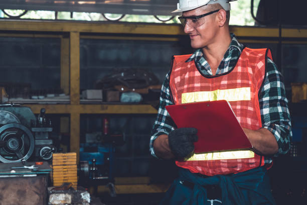 istock Smart factory worker or engineer do machine job in a manufacturing workshop 1300609044