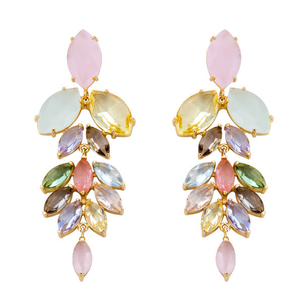 istock Golden earrings with gemstone isolated on white background 1300609113