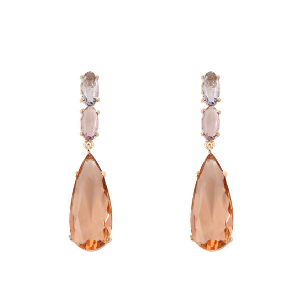 istock Golden earrings with gemstone isolated on white background 1300609197