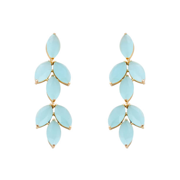 istock Golden earrings with gemstone isolated on white background 1300609234
