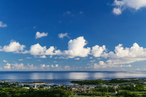 istock Okinawa sea, blue sky and summer clouds 1300611052
