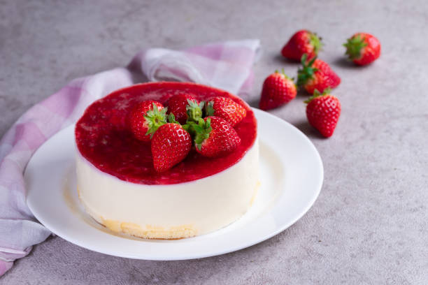 istock Homemade cheesecake with white chocolate and strawberries 1300616657