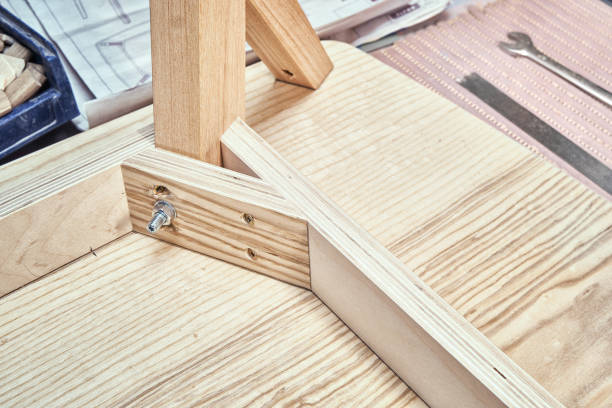istock Table corner of plywood, veneer and solid ash in workshop 1300620474