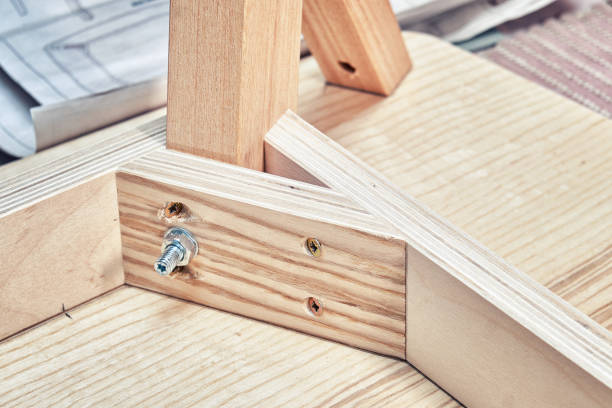 istock Table corner of plywood, veneer and solid ash in workshop 1300620484