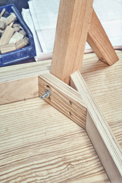 istock Table corner of plywood, veneer and solid ash in workshop 1300620494