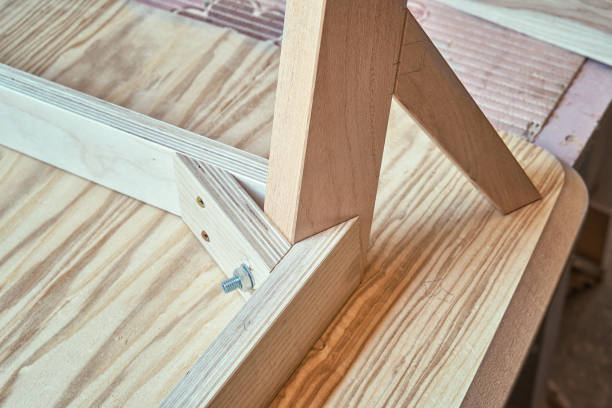 istock Table corner of plywood, veneer and solid ash in workshop 1300620524
