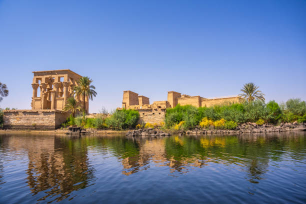 the beautiful temple of philae and the greco-roman buildings seen from the nile river, a temple dedicated to isis, goddess of love. aswan. egyptian - khafre imagens e fotografias de stock