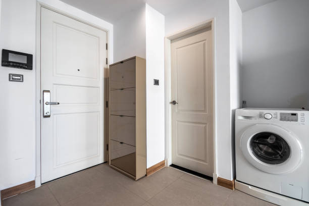 istock Washing machine corner in a small condo 1300627494