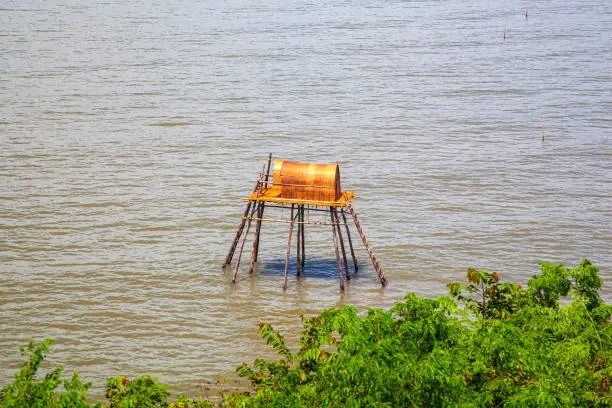 Photo of A place for fishermen by the sea, a traditional stilt house in the ocean in Vietnam