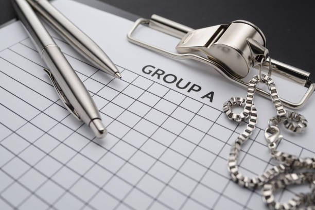 istock Clipboard with blank paper form,  metal whistle and pen. 1300634497