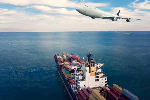 istock Cargo airplane flying over the commercial port. 1300635447