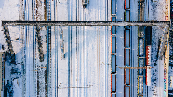 Snow-covered the railway connections. Snowy day, blizzard. Aerial drone view.