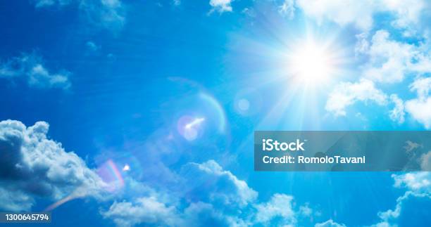 Abstract Weather Concept Sun In Serene Sky With Flare Effect Stock Photo - Download Image Now