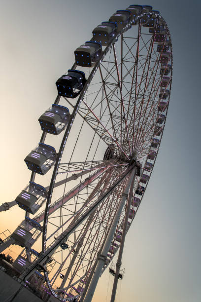 istock big wheelw amusement park in the evening 1300646950