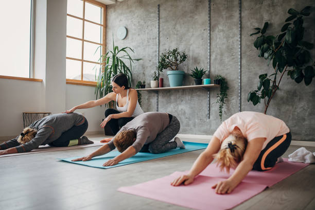 istock Senior women on yoga class 1300650619