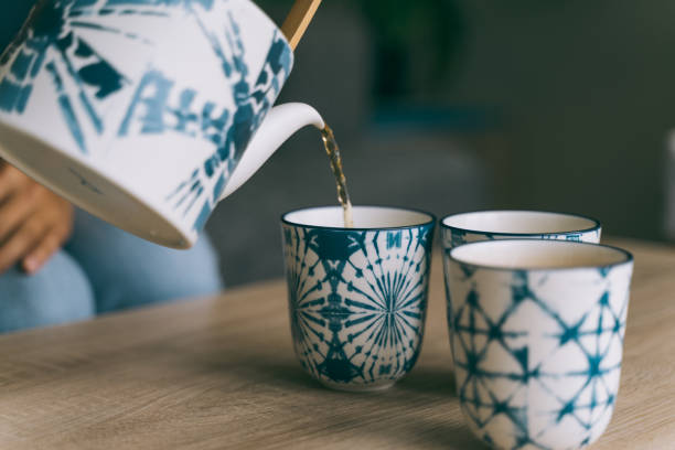 istock still life shoot with Asian teapot and cups 1300653910