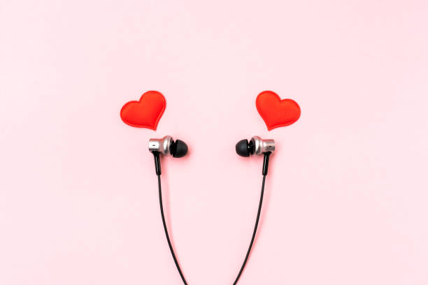 istock Headphones like a pair of lovers. 1300655496