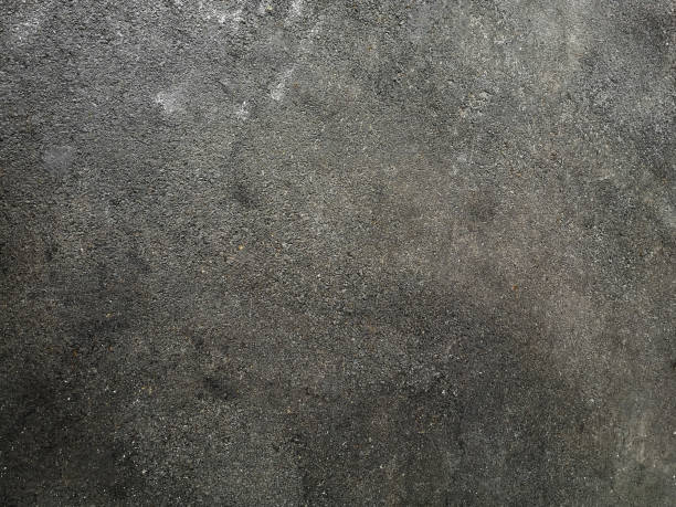 istock Asphalt floor Stone flake black, color rough finish surface road, pavement, walkway texture material background 1300656384