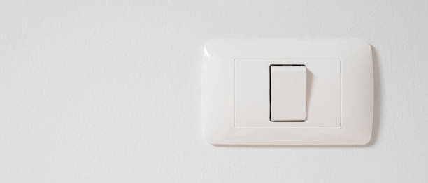 istock a light switch, a plastic mechanical switch of white color 1300661153