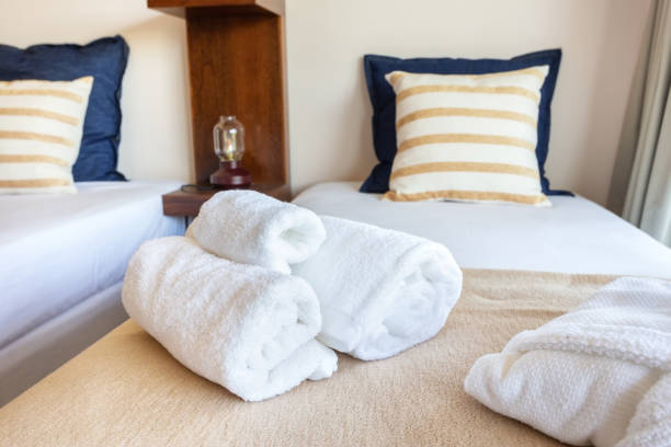 istock Modern bedroom. European hotel design bathrobe. Close-up. White background. 1300662743