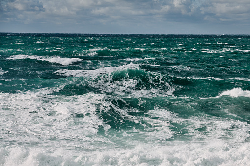 Wild waves and rough sea at Newquay, Cornwall on a windy Autumn day.